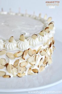 Perfect White Cake meal topped with an Amaretto Cream Cheese frosting and toasted almonds. YUM!!!